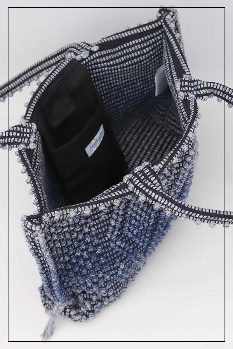 Internal pocket view for MELANGE BLUE with BLACK GROUND RECTANGULAR TOTE bag to complete your look with our selection of accessories crafted with the environment in mind