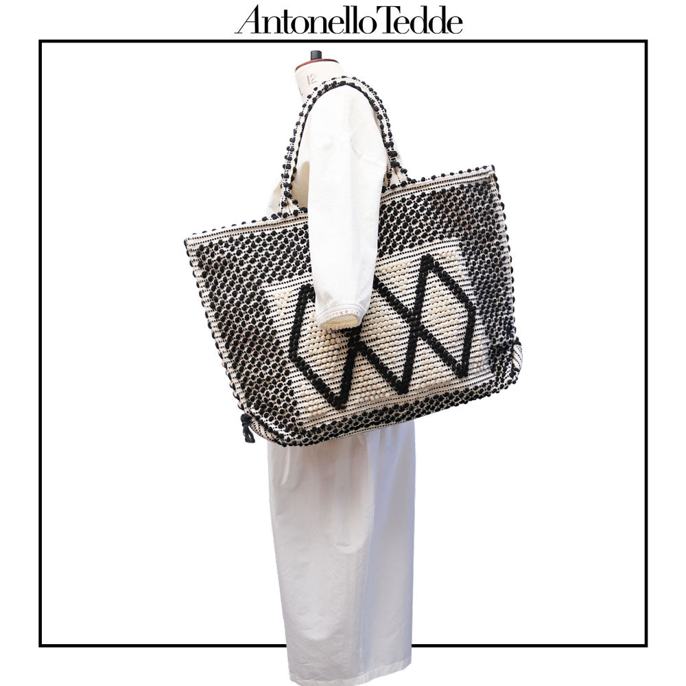 model view front handbag - Sustainable tote - summer bag - luxury handbag - handwoven black and white tote made in Italy by hand • timeless individualistic fashion • eco-friendly fashion • socially responsible, lasting fashion