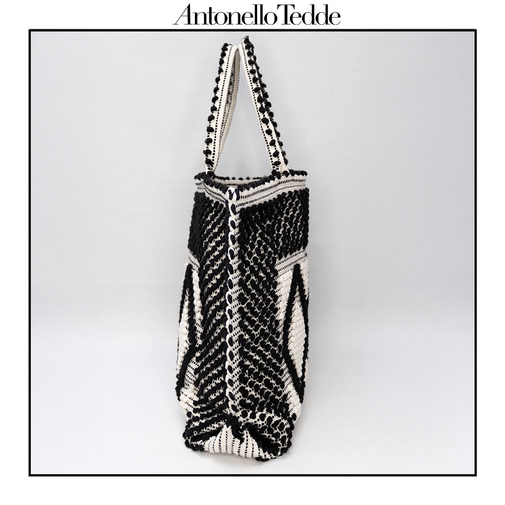 Side view front handbag - Sustainable tote - summer bag - luxury handbag - handwoven black and white tote made in Italy by hand • timeless individualistic fashion • eco-friendly fashion • socially responsible, lasting fashion