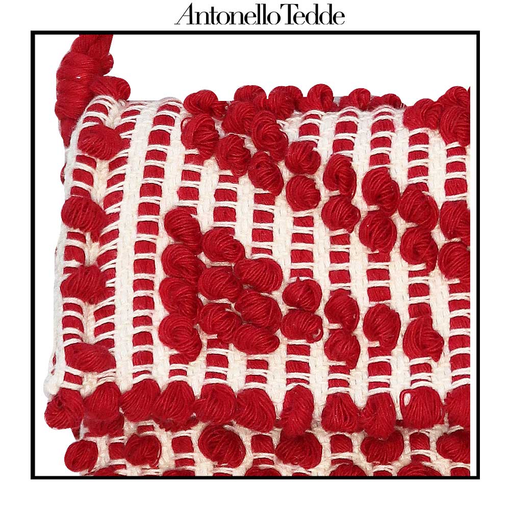 Detailed view of the Red and Cream ground beloved style within the Antonello Tedde collection, the Suni Rombi clutch bag cross-body Bag is celebrated for its effortless blend of elegance, function, and sustainable craftsmanship.