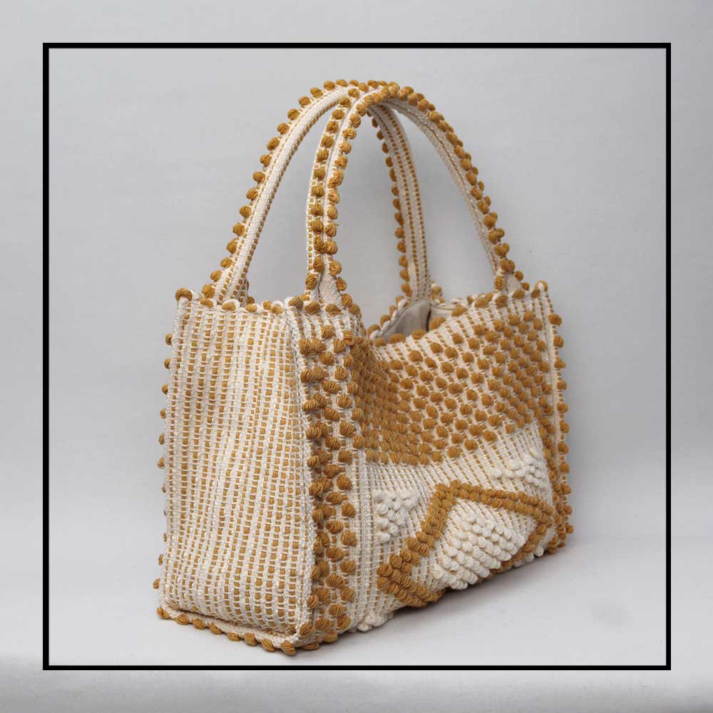 MONTE SANTU - HOBO BAG - side view MUSTARD and CREAM linen handbag - Best eco luxury bags and accessories brand. Stylish clothes and Eco-Friendly with recycled yarns #luxury #ecoconcious #sustainablestyle #ethicalbrands #ecoliving #ecofashion #ecostyle #ethicalhandbags #handbags