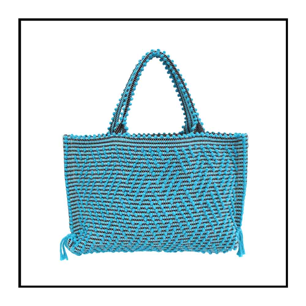 Capriccioli Medium zig zag- The bag is made using authentic Sardinian hand weaving methods in ethically managed factories. This tote bag is extraordinary and evokes faraway cultures with a contemporary touch, with focus on details such as colour, and material that are sustainable and eco-conscious