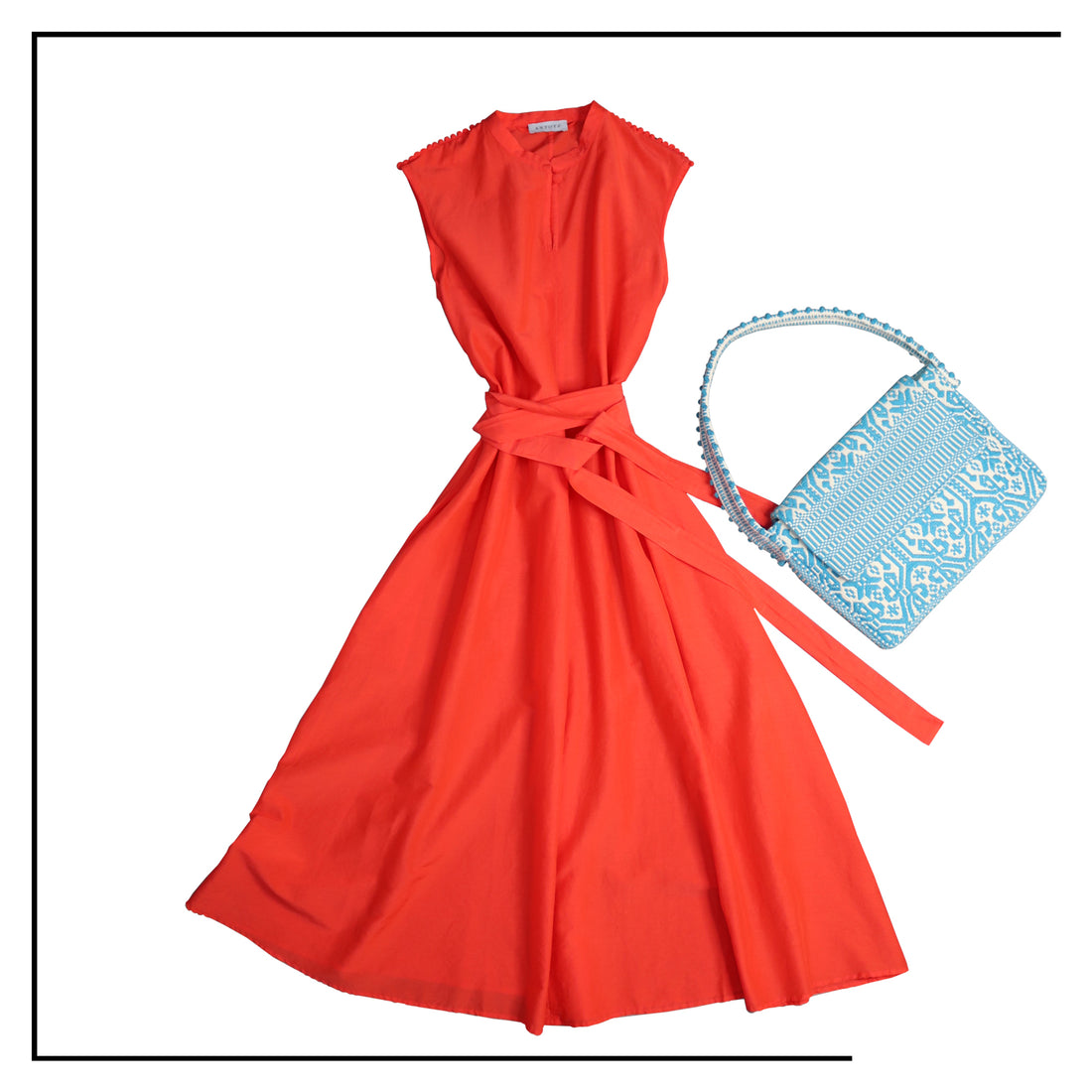 red dress with turquoise bag #ethicalbrands #ecoliving  #ecofashion #ecostyle #ethicalhandbags #handbags #sustainas brand. Stylish clothes and Eco-Friendly with recycled yarns #luxury #ecoconcious #sustainablestblelifestyle #ethicalfashion #sustainability