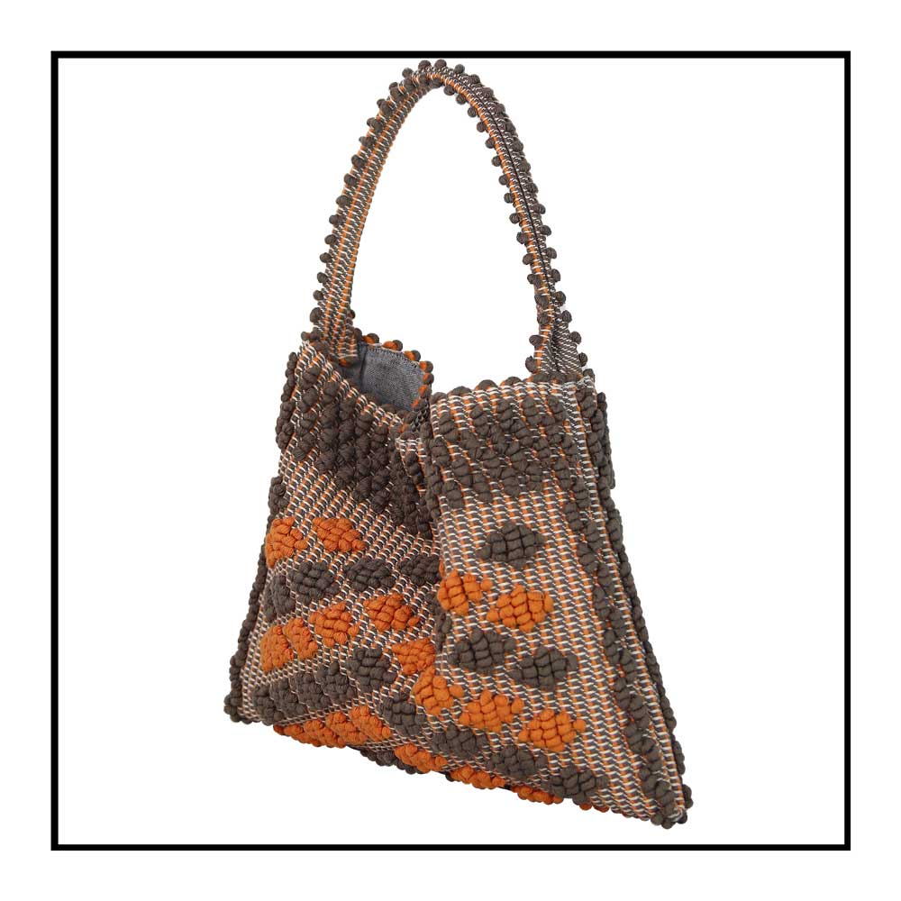 Side view of Quality eco-conscious hobo bag handwoven orange and taupe. Stylish clothes and Eco-Friendly with recycled yarns #luxury #ecoconcious #sustainablestyle  #ethicalbrands #ecoliving  #ecofashion #ecostyle #ethicalhandbags #handbags #sustainablelifestyle #ethicalfashion #sustainability