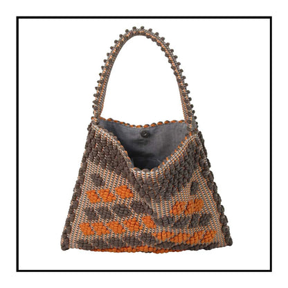 Open bag, lining view of Quality eco-conscious hobo bag handwoven orange and taupe. Stylish clothes and Eco-Friendly with recycled yarns #luxury #ecoconcious #sustainablestyle  #ethicalbrands #ecoliving  #ecofashion #ecostyle #ethicalhandbags #handbags #sustainablelifestyle #ethicalfashion #sustainability