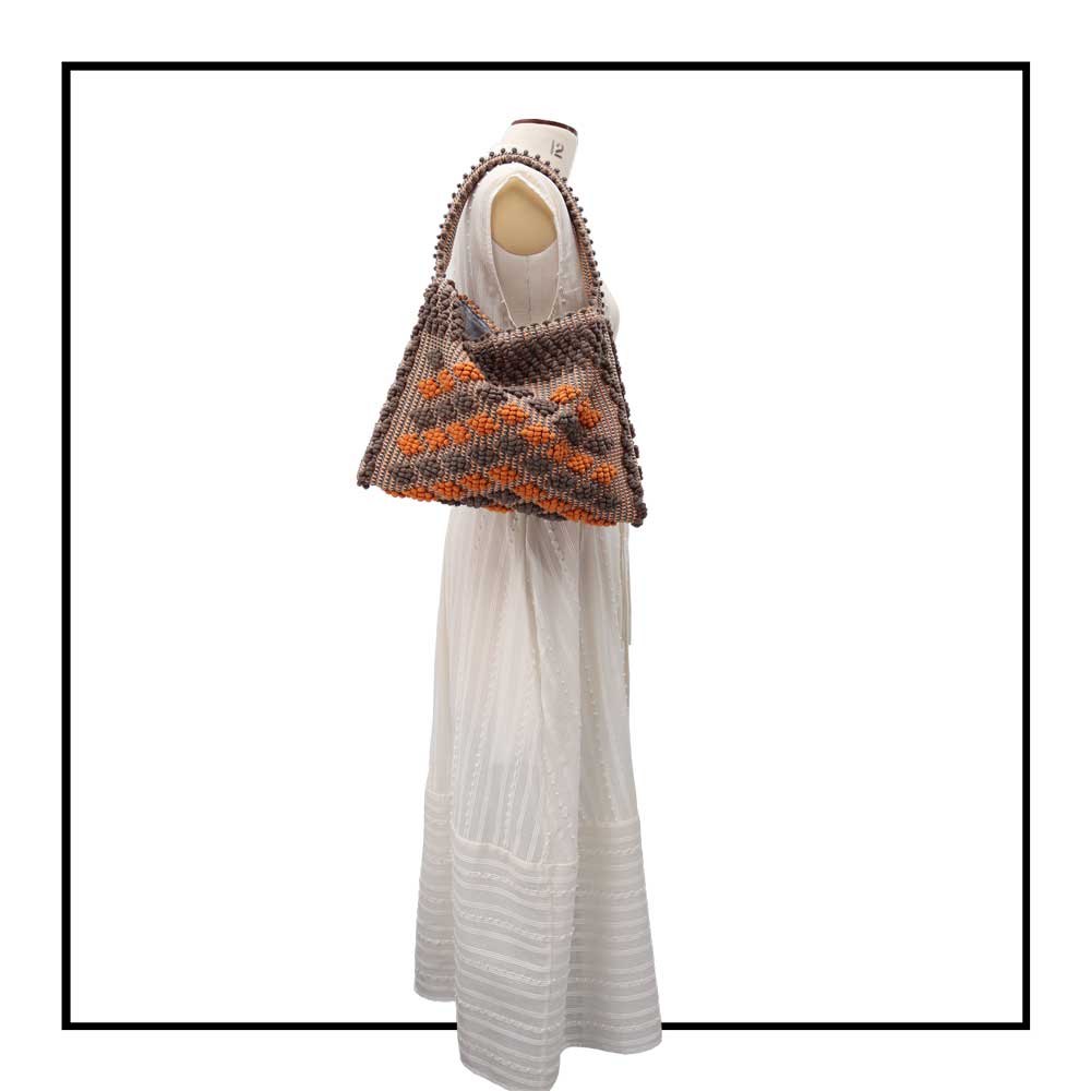 Full length On stand, size 12 view of Quality eco-conscious hobo bag handwoven orange and taupe. Stylish clothes and Eco-Friendly with recycled yarns #luxury #ecoconcious #sustainablestyle  #ethicalbrands #ecoliving  #ecofashion #ecostyle #ethicalhandbags #handbags #sustainablelifestyle #ethicalfashion #sustainability