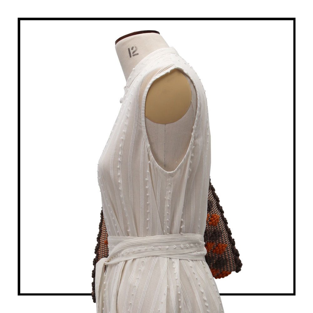 Detailed On stand, size 12, side view of Quality eco-conscious hobo bag handwoven orange and taupe. Stylish clothes and Eco-Friendly with recycled yarns #luxury #ecoconcious #sustainablestyle  #ethicalbrands #ecoliving  #ecofashion #ecostyle #ethicalhandbags #handbags #sustainablelifestyle #ethicalfashion #sustainability