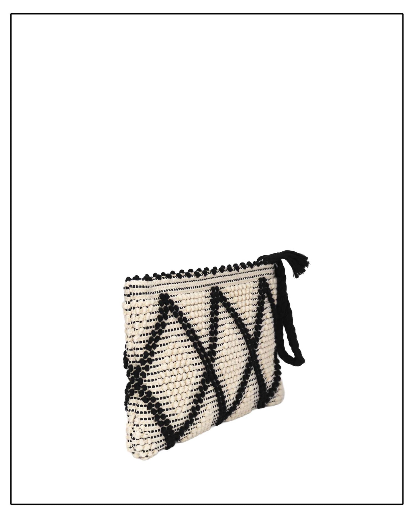 Antonello Tedde cream and white  clutch bag with multiple diamond patterns and pom-pom details on a white background - side view
