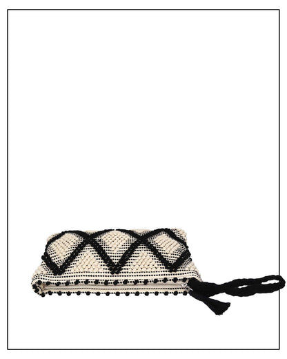 Antonello Tedde cream and white  clutch bag with multiple diamond patterns and pom-pom details on a white background - opening view