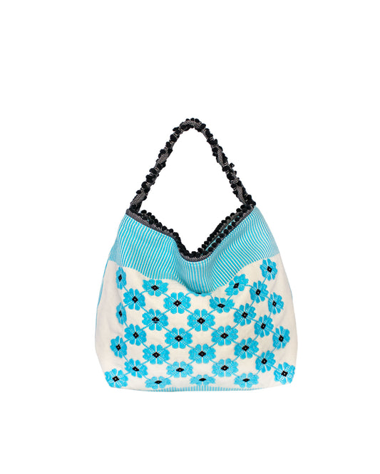 Handbag with floral pattern on a white background