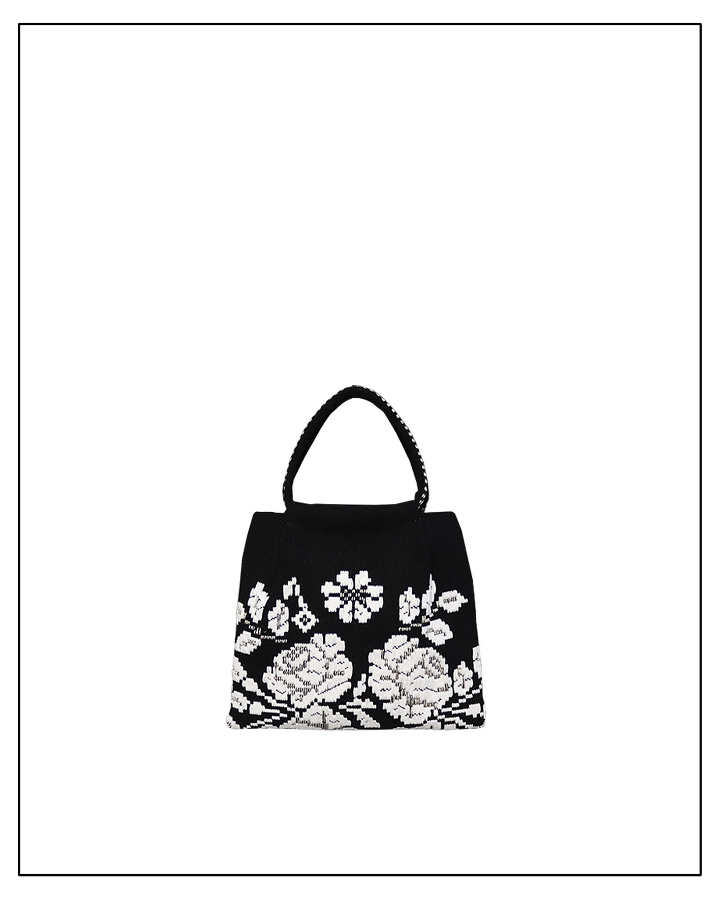 Black handbag with white floral embroidery on a white background - ANTONELLO TEDDE black and white evening bag to complete your look, with our selection of accessories crafted with the environment in mind