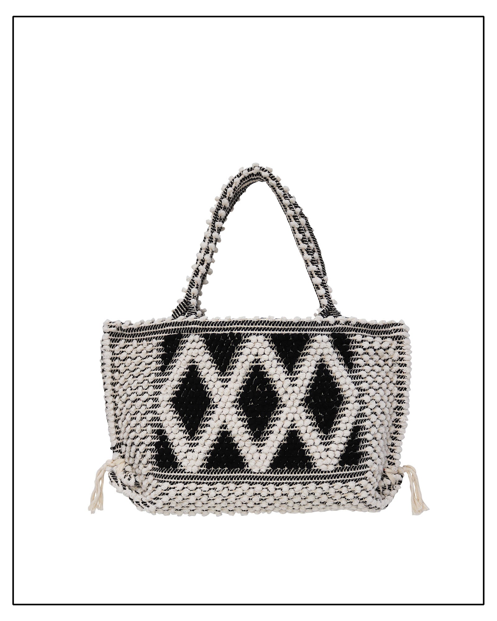 Woven handbag with a black geometric pattern on a white background.  Antonello Tedde's luxury eco-conscious fashion. 