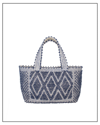 Woven handbag with blue and white pattern on a white background - Front view of Antonello Tedde Celvia Medium Tote Bag in handwoven melange blue cotton with large diamond rombi pattern
