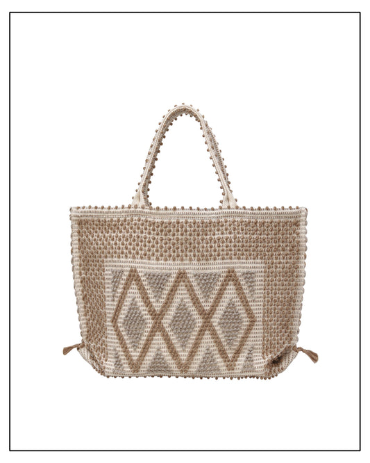 Woven handbag with geometric pattern on a white background by Antonello Tedde
