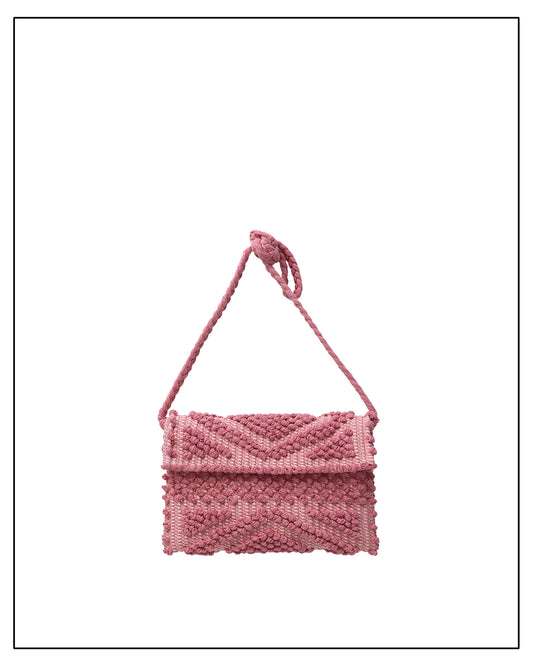 An Antonello Tedde small pink handwoven shoulder bag with a textured diamond pattern and a matching knotted strap, shown against a plain white background.