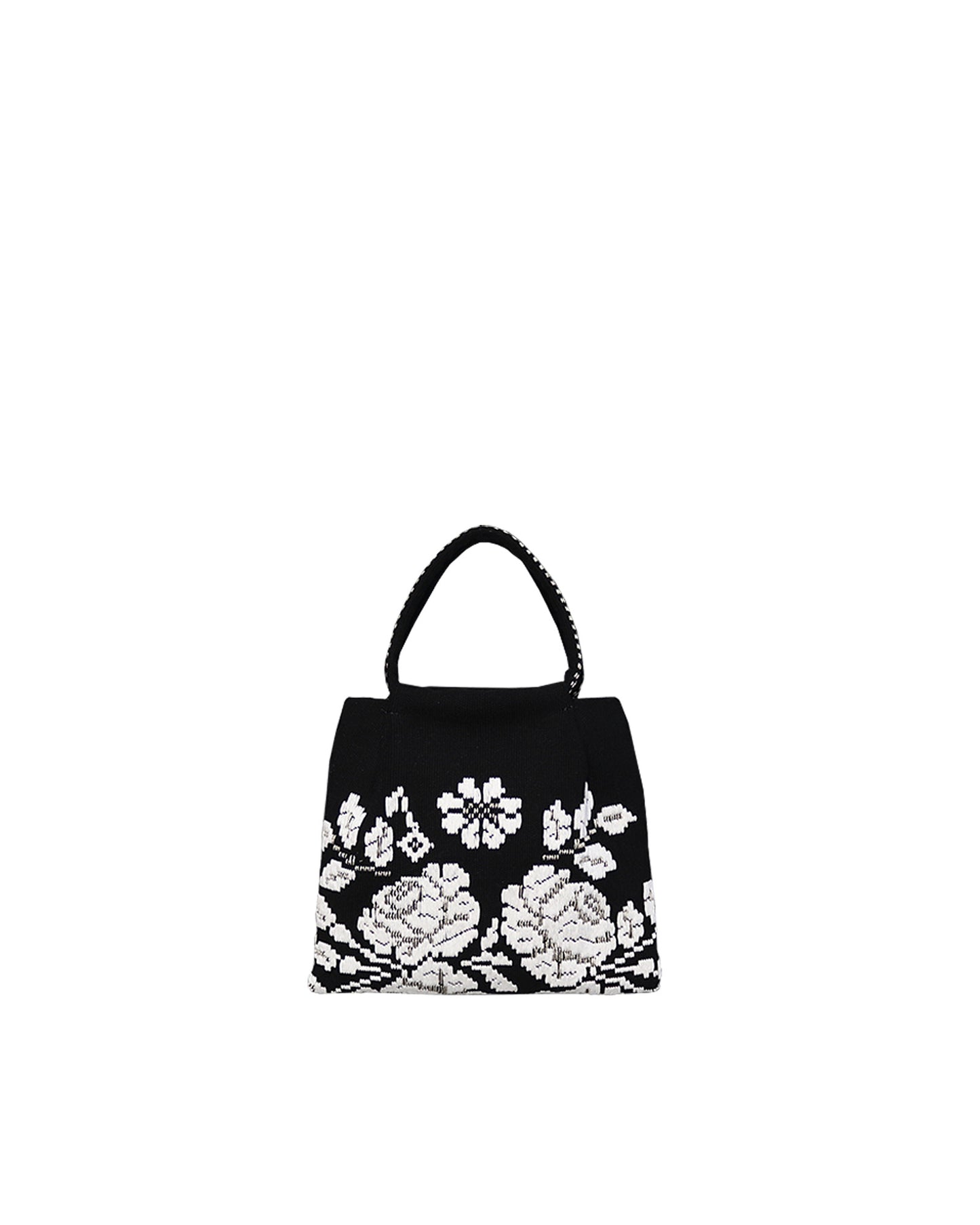 on a model with a black dress, the black and white evening bag to complete your look with our selection of accessories crafted with the environment in mind