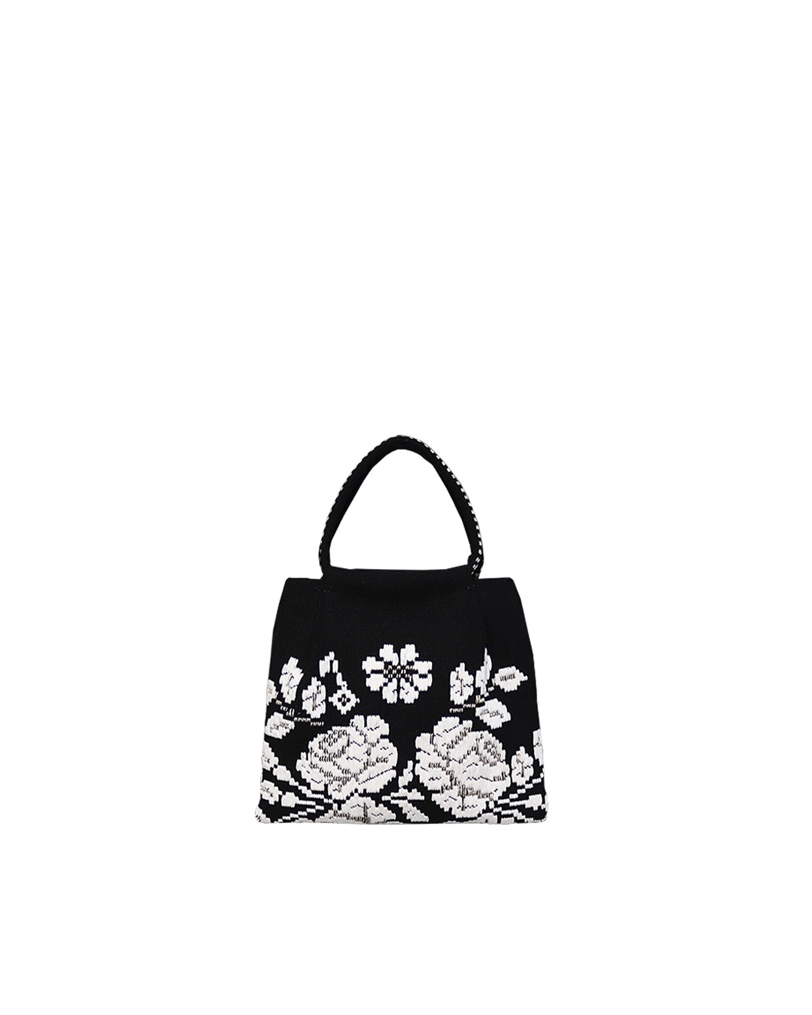 on a model with a black dress, the black and white evening bag to complete your look with our selection of accessories crafted with the environment in mind