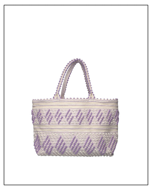 Antonello Tedde Mugoni Zig Zag Tote Bag, handwoven in Sardinia from linen and cotton with geometric zig zag weave and diamond motifs -  frontal view of tote bag with purple on a cream background