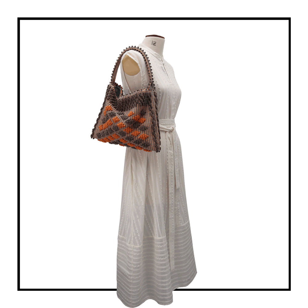 Gallery of Quality eco-conscious hobo bag handwoven orange and taupe. Stylish clothes and Eco-Friendly with recycled yarns #luxury #ecoconcious #sustainablestyle  #ethicalbrands #ecoliving  #ecofashion #ecostyle #ethicalhandbags #handbags #sustainablelifestyle #ethicalfashion #sustainability
