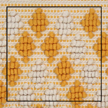 Fabric close-up view of the Piatta Clutch Zip Bag, yellow and cream, sleek and sophisticated accessory designed for modern elegance. This compact clutch combines minimalist design with exceptional craftsmanship, making it a versatile companion for any occasion.