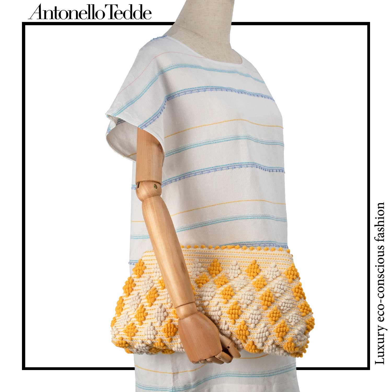 Model view of Piatta Clutch Zip Bag, yellow and cream, sleek and sophisticated accessory designed for modern elegance. This compact clutch combines minimalist design with exceptional craftsmanship, making it a versatile companion for any occasion.