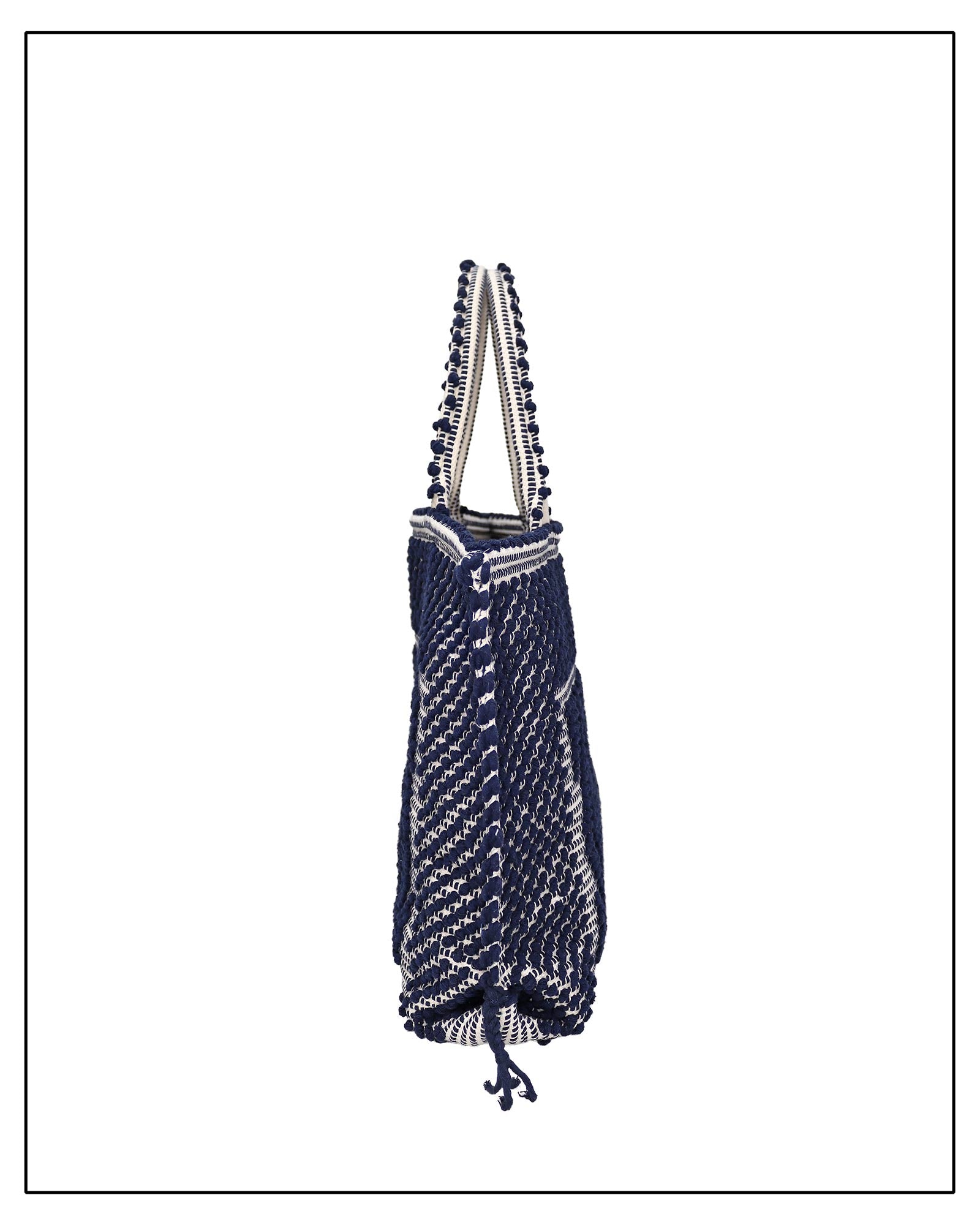 Side view of handbag capriccioli by Antonello Tedde - Sustainable tote - summer bag - luxury handbag - handwoven BLUE with CREAM base tote made in Italy by hand • timeless individualistic fashion • eco-friendly fashion • socially responsible, lasting fashion.