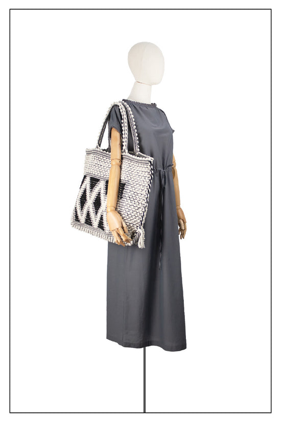 Large TOTE CREAM AND BLACK ON MODEL - summer bag - luxury handbag - handwoven tote made in Italy by hand • timeless individualistic fashion • eco-friendly fashion • socially responsible, lasting fashion.