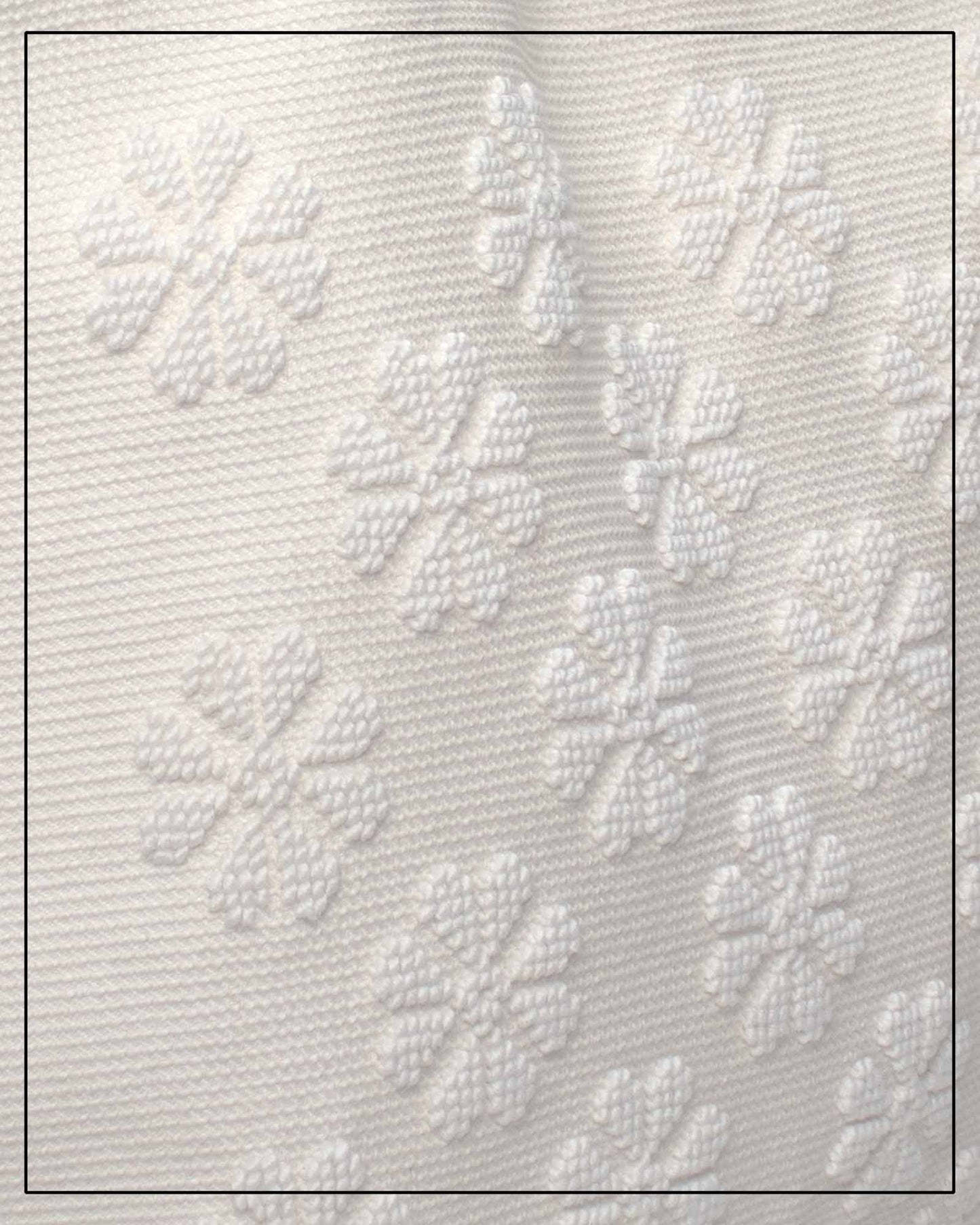 Textured white fabric with floral patterns by Antonello Tedde