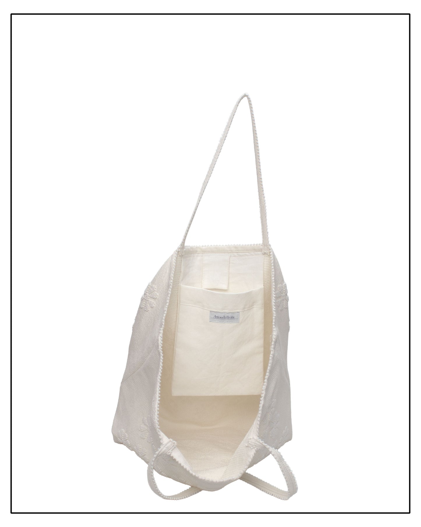 internal view of Raised flower pattern handwoven cream tote bag, all by Antonello Tedde