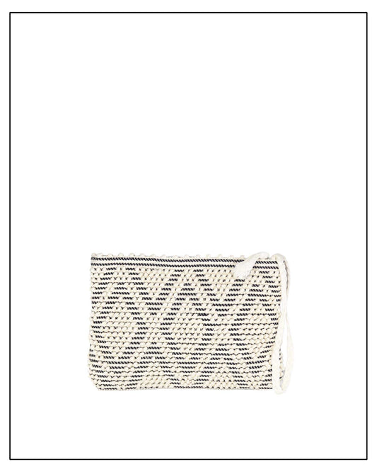 Antonello Tedde Hand-woven clutch bag with black and white pattern on a white background
