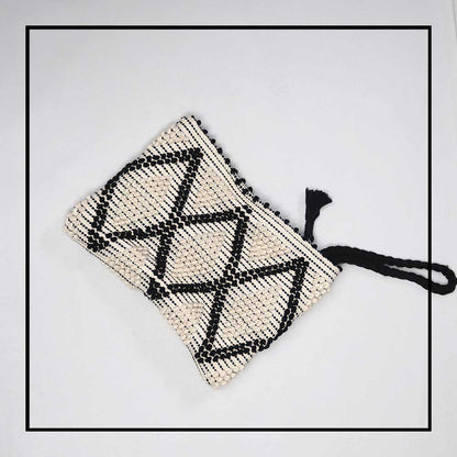 soft frontal view of the handbag - Sustainable tote - summer bag - luxury handbag - handwoven black and white tote made in Italy by hand • timeless individualistic fashion • eco-friendly fashion • socially responsible, lasting fashion.