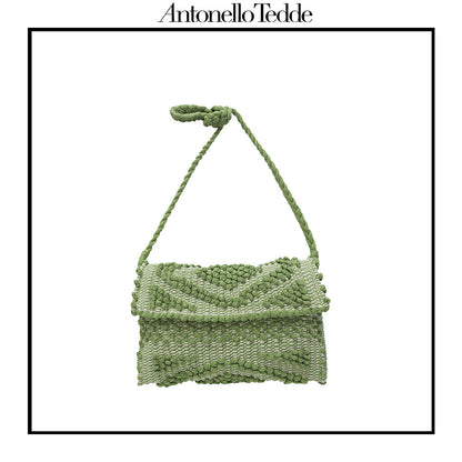 Green ground beloved style within the Antonello Tedde collection, the Suni Rombi clutch cross-body Bag is celebrated for its effortless blend of elegance, function, and sustainable craftsmanship.