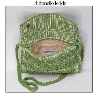 Open view of the green ground beloved style within the Antonello Tedde collection, the Suni Rombi Clutch cross-body.   The bag is celebrated for its effortless blend of elegance, function, and sustainable craftsmanship.