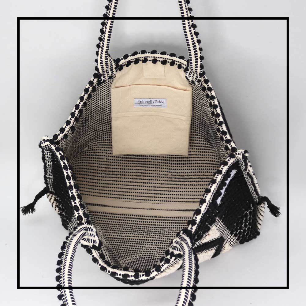 inside of the handbag with pocket - Sustainable tote - summer bag - luxury handbag - handwoven black and white tote made in Italy by hand • timeless individualistic fashion • eco-friendly fashion • socially responsible, lasting fashion.