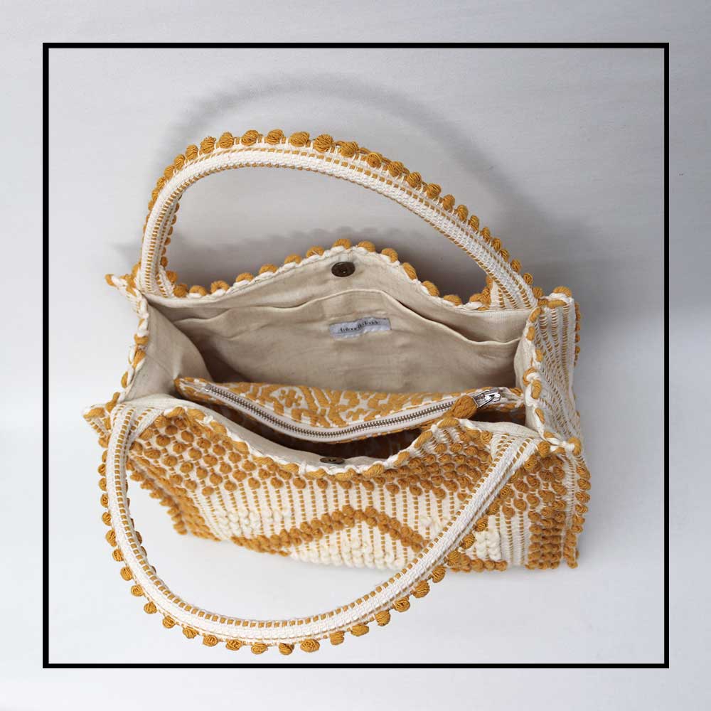 MONTE SANTU - HOBO BAG - inside view lining MUSTARD and CREAM linen handbag -  Best eco luxury bags and accessories brand. Stylish clothes and Eco-Friendly with recycled yarns #luxury #ecoconcious #sustainablestyle  #ethicalbrands #ecoliving  #ecofashion #ecostyle #ethicalhandbags #handbags