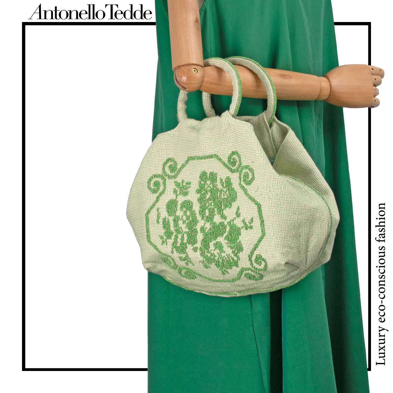 A handwoven green Faona tote bag with a small pibiones flower bouquet pattern and golden thread was crafted from regenerated cotton by Sardinian artisans.