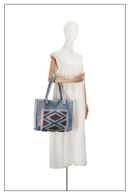 ON MODEL FULL VIEW FOR PROPORTIONS VIEW OF CHOC and DENIM medium tote bag  to complete your look with our selection of accessories crafted with the environment in mind