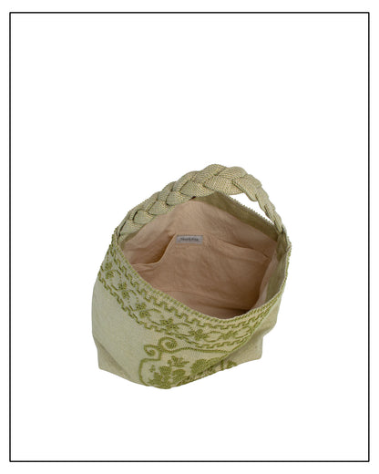 Antonello Tedde Banari Tote Bag handwoven in Sardinia using the traditional small Pibiones technique with green regenerated cotton, golden yarn, and floral bouquet motif. Inside view