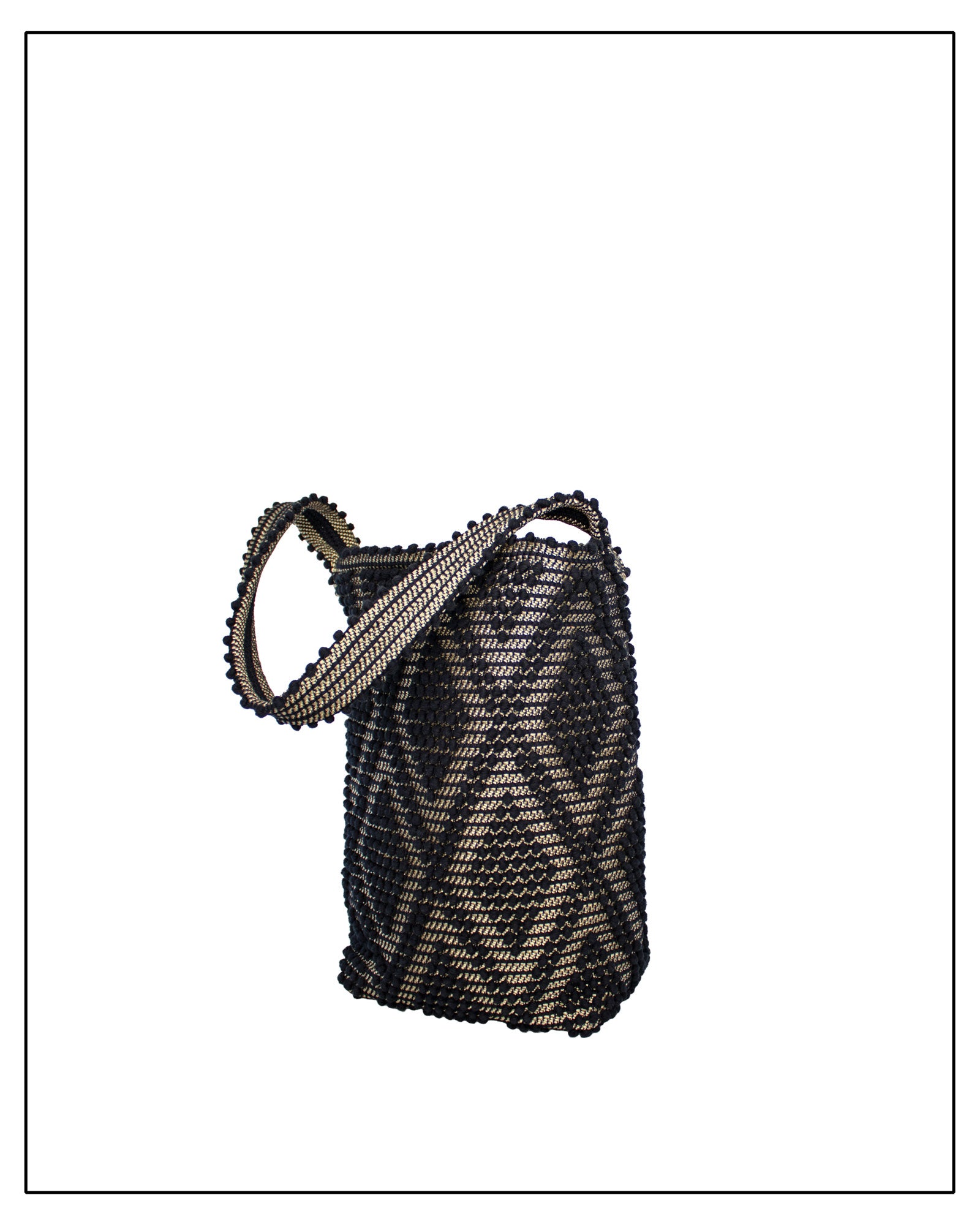 Antonello Tedde Bultei Rombi shoulder bucket bag, handwoven in Sardinia from black cotton with a shimmering golden viscose diamond pattern. 