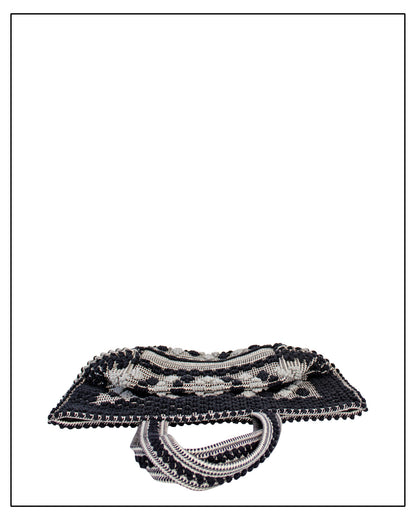 Flat folded view of Antonello Tedde Capriccioli Large handwoven cotton tote bag in black and grey with Rombetti small diamond pattern. 