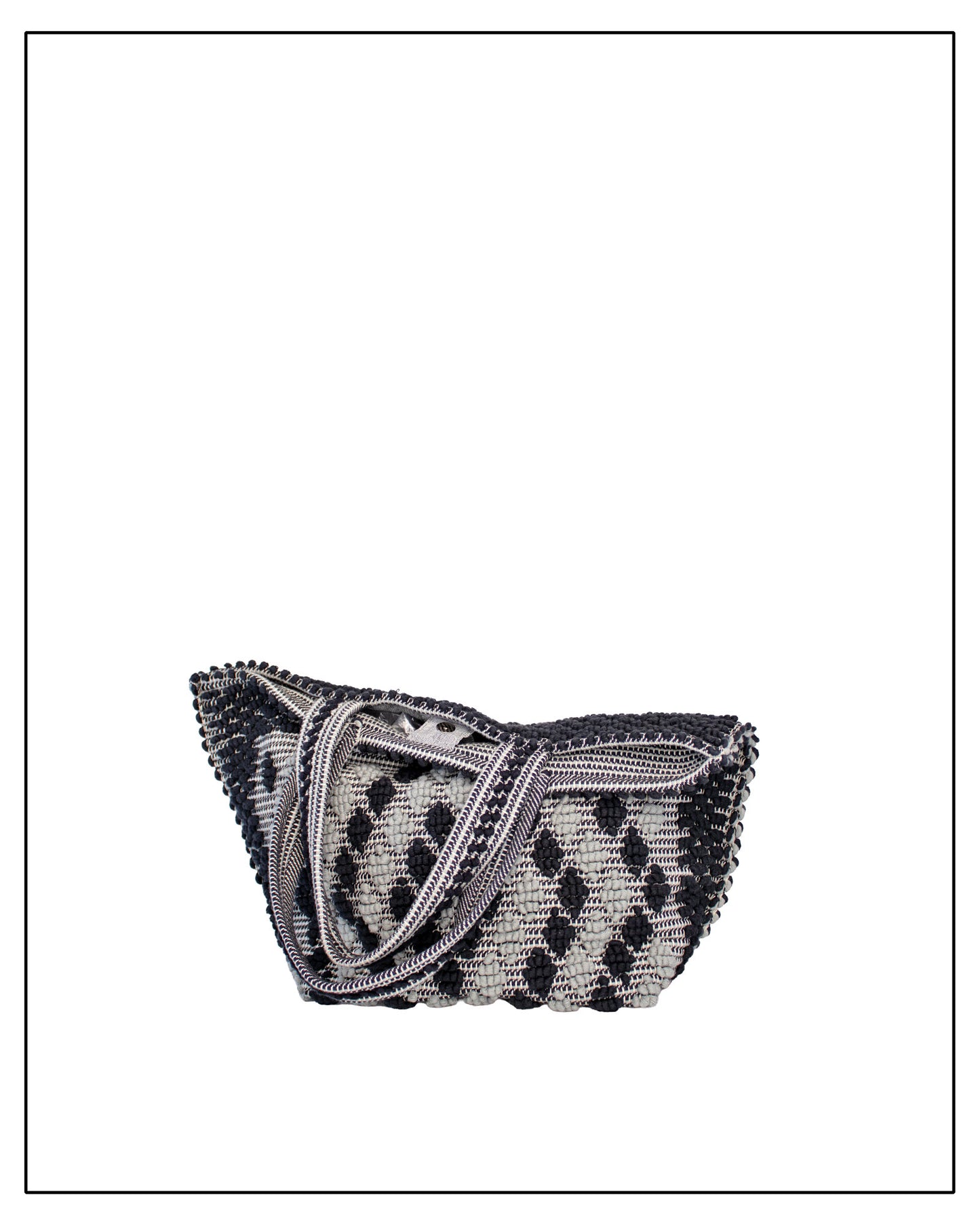 Folded view of Antonello Tedde Capriccioli Large handwoven cotton tote bag in black and grey with Rombetti small diamond pattern.