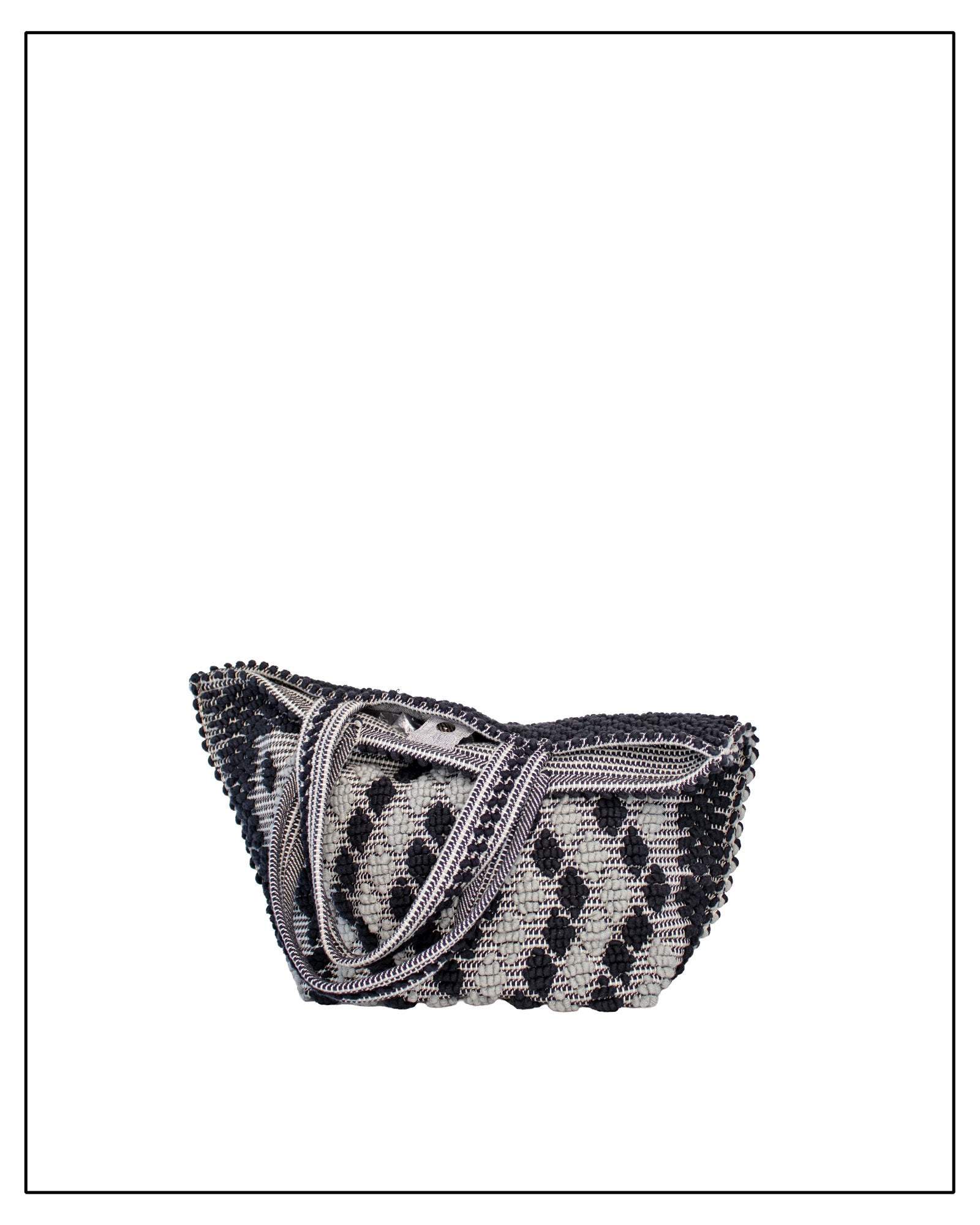Folded view of Antonello Tedde Capriccioli Large handwoven cotton tote bag in black and grey with Rombetti small diamond pattern.