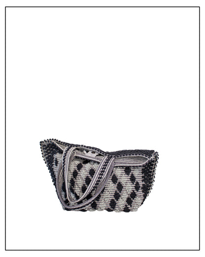 Folded view of Antonello Tedde Capriccioli Large handwoven cotton tote bag in black and grey with Rombetti small diamond pattern.