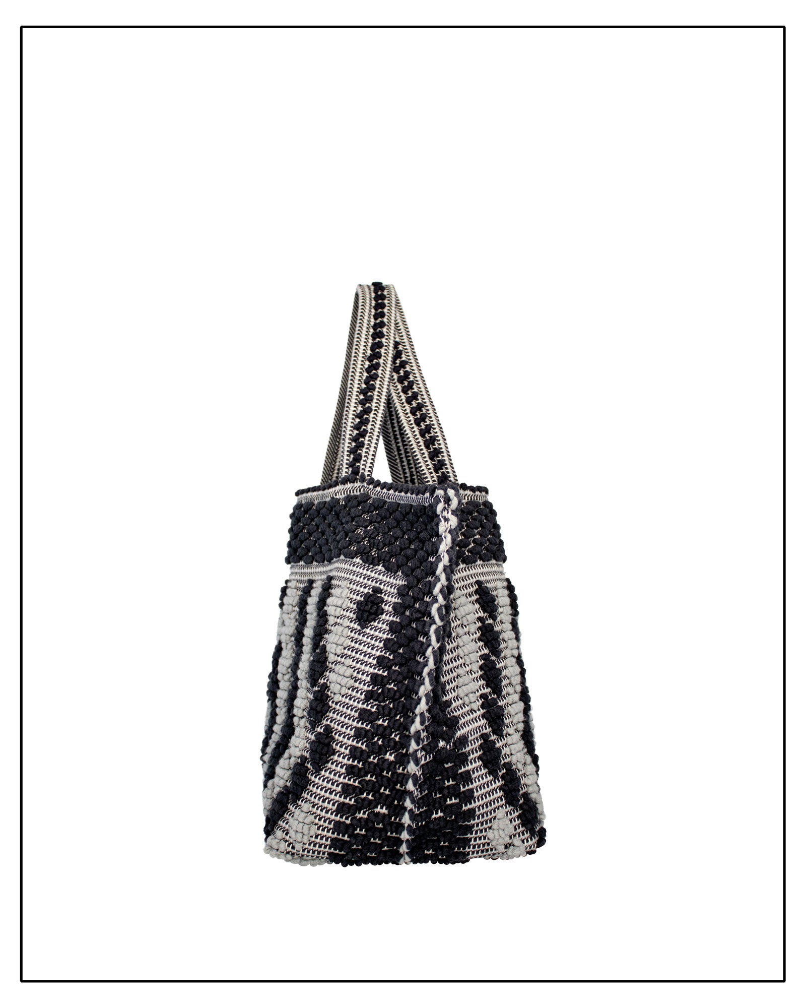 Side view two of Antonello Tedde Capriccioli Large handwoven cotton tote bag in black and grey with Rombetti small diamond pattern.