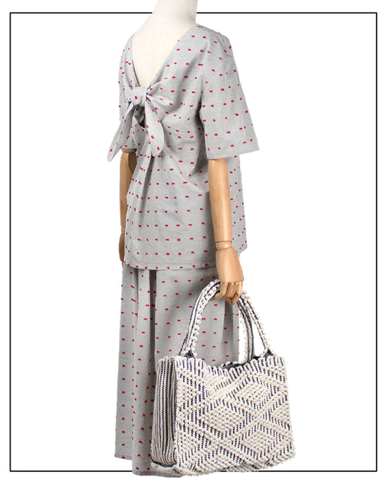 HOBO CREAM LINEN ON MODEL - summer bag - luxury handbag - handwoven tote made in Italy by hand • timeless individualistic fashion • eco-friendly fashion • socially responsible, lasting fashion.