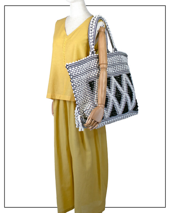 Large TOTE CREAM AND BLACK ON MODEL - summer bag - luxury handbag - handwoven tote made in Italy by hand • timeless individualistic fashion • eco-friendly fashion • socially responsible, lasting fashion.