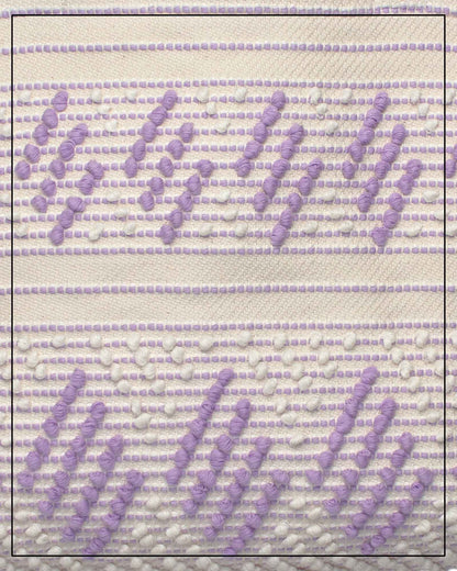 Antonello Tedde Mugoni Zig Zag Tote Bag, handwoven in Sardinia from linen and cotton with geometric zig zag weave and diamond motifs - close up view of tote bag with purple on a cream background