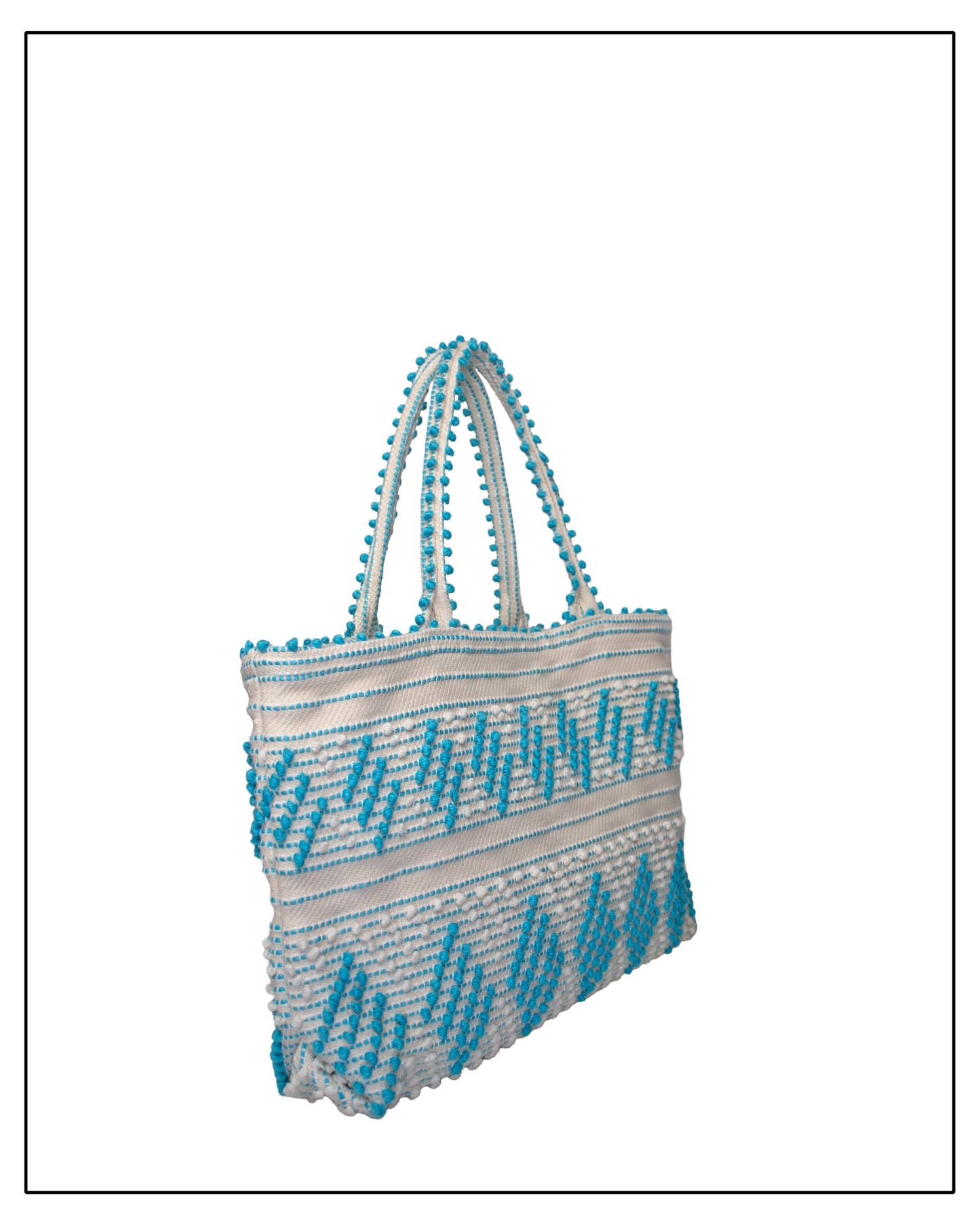 Antonello Tedde Mugoni Zig Zag Tote Bag, handwoven in Sardinia from linen and cotton with geometric zig zag weave and diamond motifs - Side view of tote bag with turquoise on a cream background