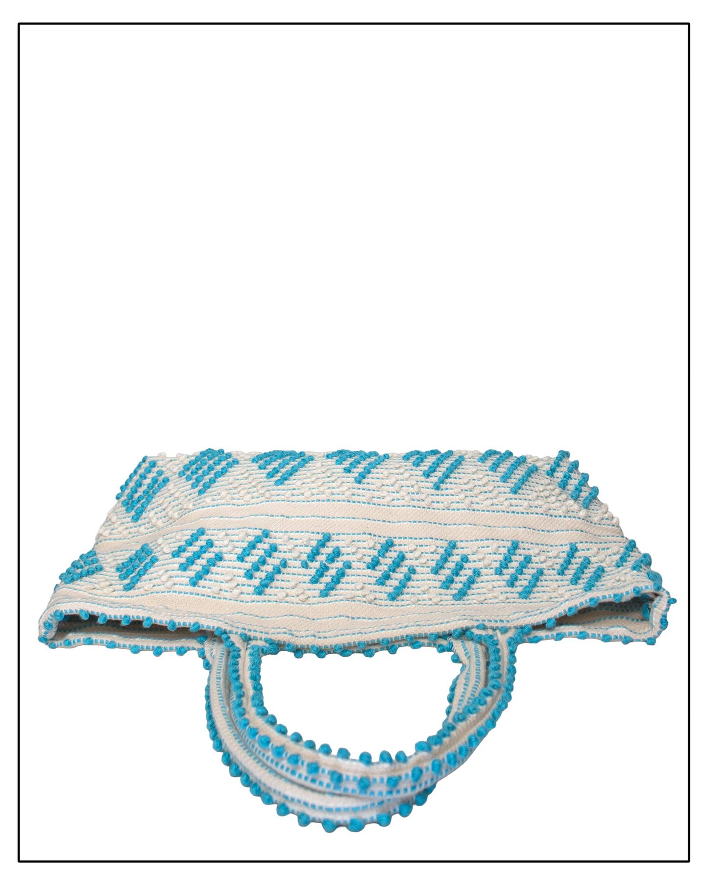 Antonello Tedde Mugoni Zig Zag Tote Bag, handwoven in Sardinia from linen and cotton with geometric zig zag weave and diamond motifs - Top view of tote bag with turquoise on a cream background