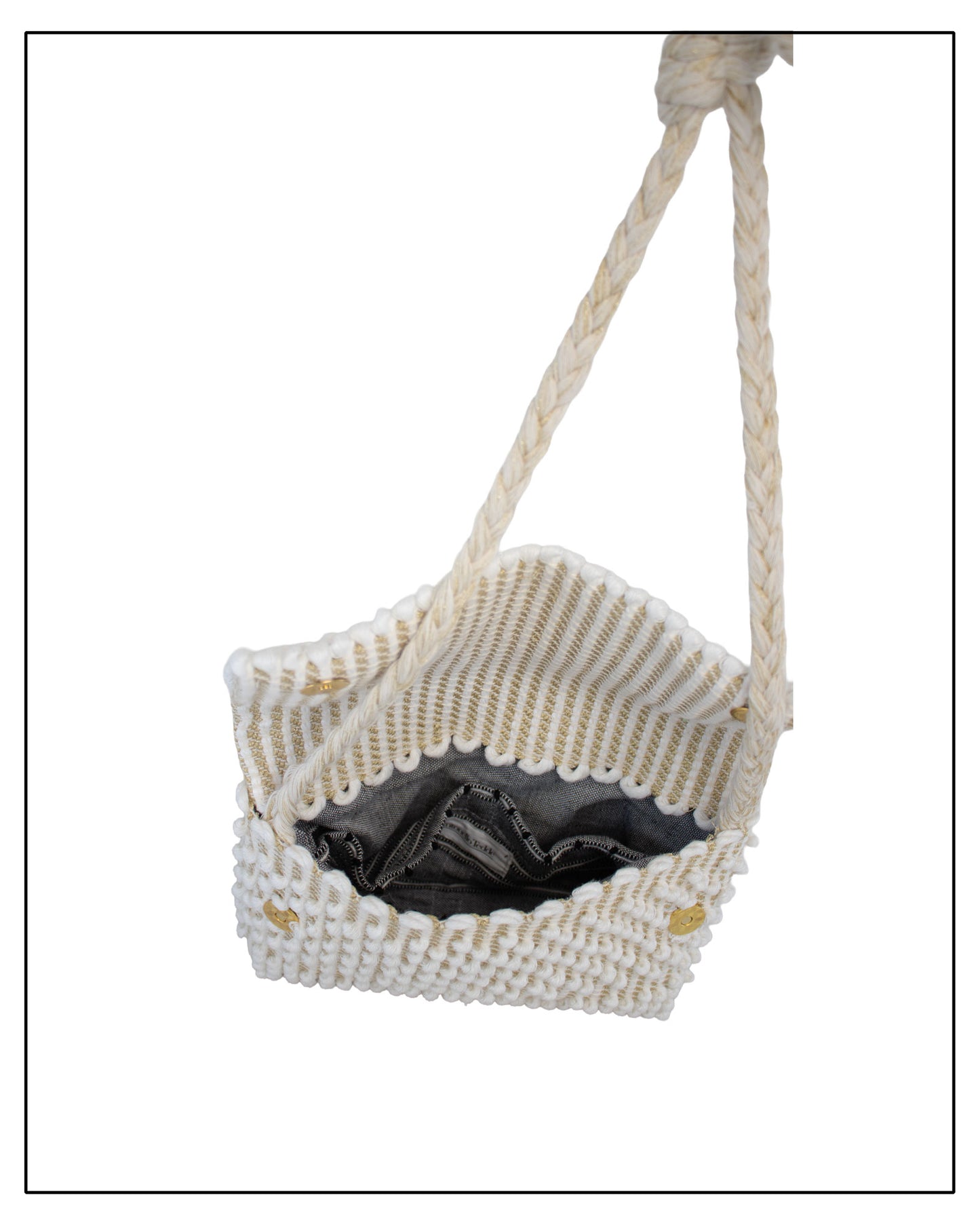 Lining view of an Antonello Tedde Suni Small crossbody bag handwoven in Sardinia in cream Italian linen, ivory and subtle golden yarn with braided strap.